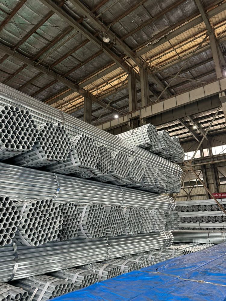 Galvanized tubing stacked at the plant